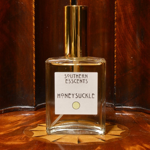 Honeysuckle Perfume -2oz- Made from essential oils extracted from fresh flowers, this sweet fragrance has a hidden surprise. Perfect Gift!