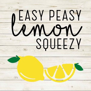 May include: A white wood background with the text "EASY PEASY lemon SQUEEZY" in black. Two yellow lemons with green leaves are shown below the text.
