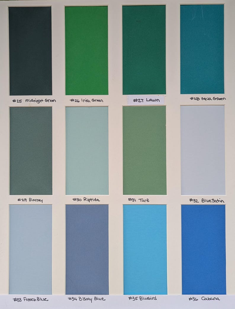 May include: A color swatch chart featuring twelve rectangular samples arranged in a grid. Each sample is labeled with a number and a name: #25 Midnight Green, #26 Irish Green, #27 Lawn, #28 Aqua Green, #29 Blarney, #30 Riptide, #31 Turf, #32 Blue Satin, #33 French Blue, #34 Biscay Blue, #35 Bluebird, and #36 Cabana.