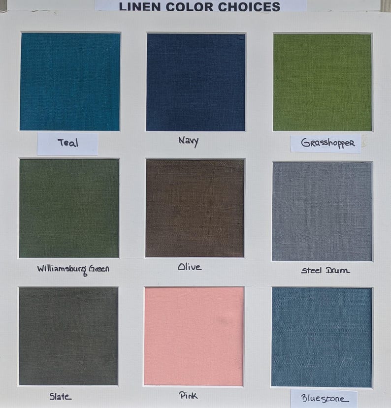 May include: A white display board titled LINEN COLOR CHOICES featuring nine square fabric swatches in teal, navy, grasshopper, williamsburg green, olive, steel drum, slate, pink, and bluestone, each labeled with its corresponding color name.