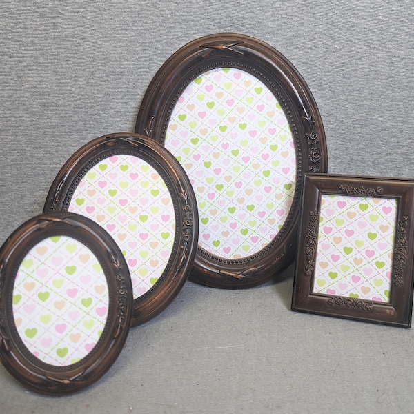 SET OF FOUR Frames Small Ovals Varying Sizes Brown Ornate with Regular Glass