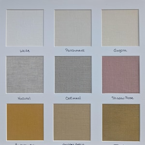 May include: A color swatch board titled LINEN COLOR CHOICES featuring nine square fabric samples in white, parchment, angora, natural, oatmeal, shadow rose, butterscotch, golden grain, and toast, each labeled with its respective color name.