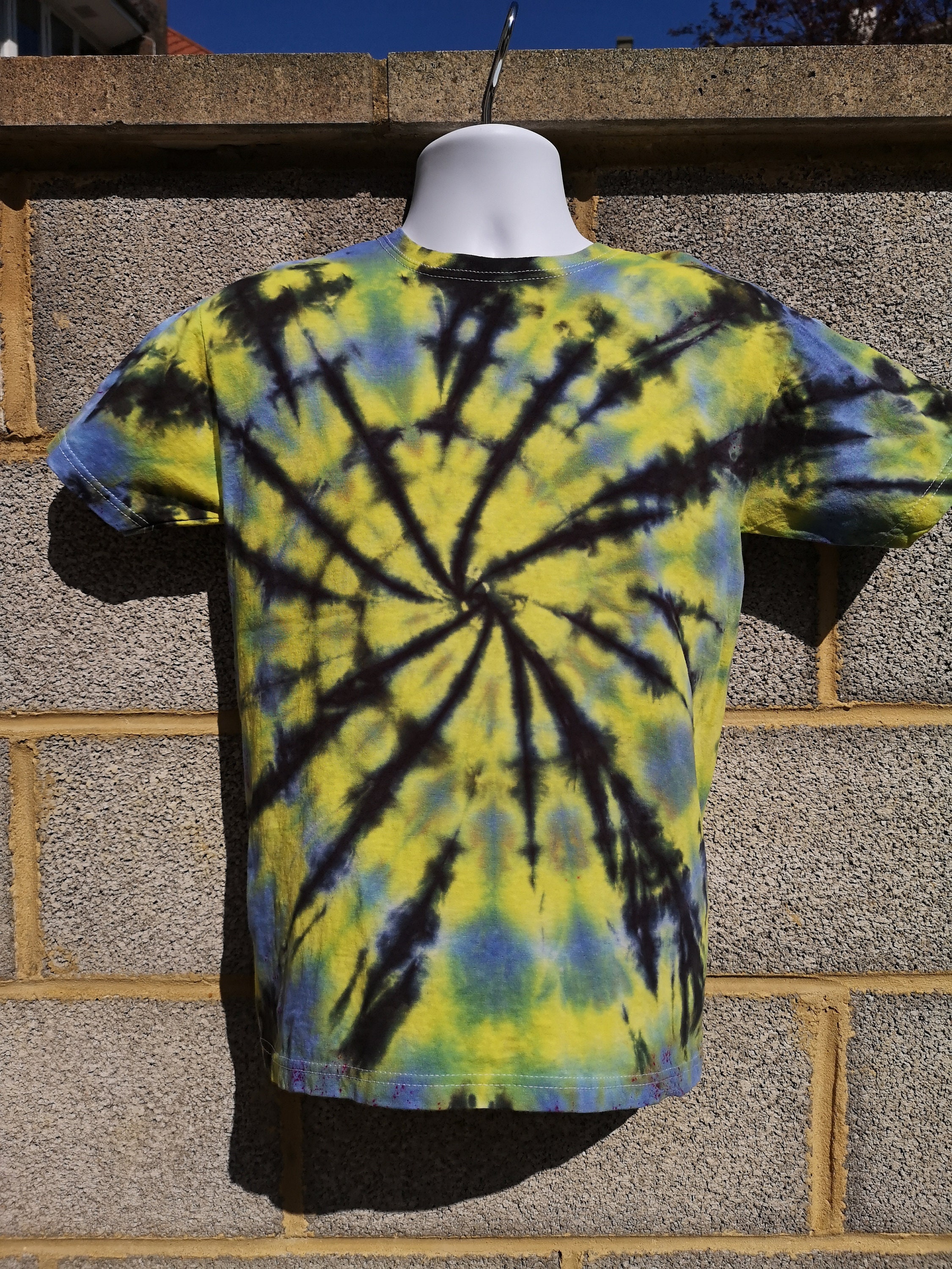tie dye on yellow shirt