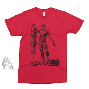 May include: Red t-shirt with a black and white anatomical illustration of a man holding a flayed human skin.