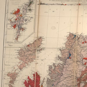 May include: A vintage map of Scotland, showing the geological formations of the country. The map is divided into sections, with each section showing a different geological feature. The map is printed in black and white, with red and blue lines indicating the different geological formations.