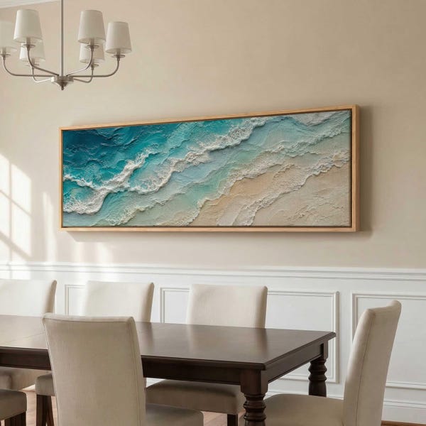 May include: A rectangular wall art piece featuring a textured, impasto-style painting of ocean waves crashing onto a sandy beach. The artwork displays shades of deep blue, turquoise, and white, framed in a light-colored wooden border.