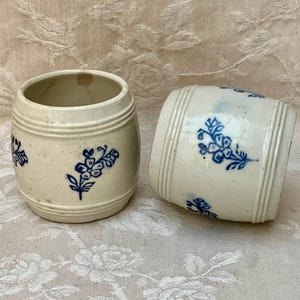 May include: A rustic wooden sign with the text "Welcome to our home" in white lettering. The sign features a distressed finish and a simple, inviting design, perfect for a front porch or entryway.