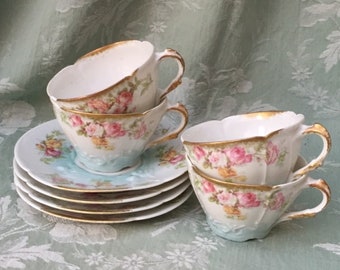 Charming Quatuor LIMoGES 1890 French Fine PORCELAIN China CUP & SAUCER PiNK/Cream ROSEs Blue Shading RAiSED DETAILiNG Gilded Petit Peigné