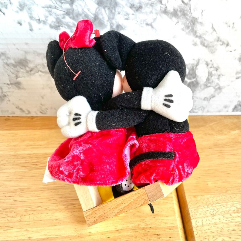 Mickey Minnie Mouse Hugging plushie doll, hugging arms around each other, rear view.