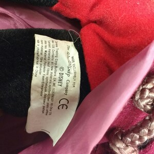 Disney tag on plush doll.