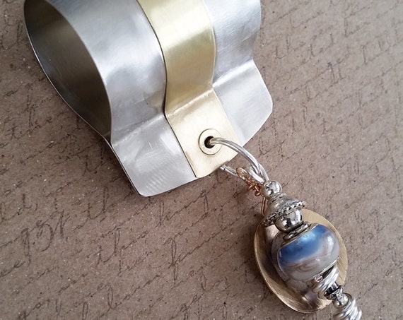 German Silver and Bronze Scarf Pendant
