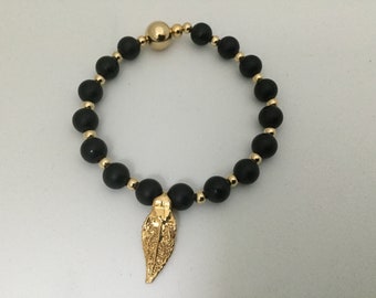 Matte Onyx Bracelets accented by gold filled beads and gold leaves