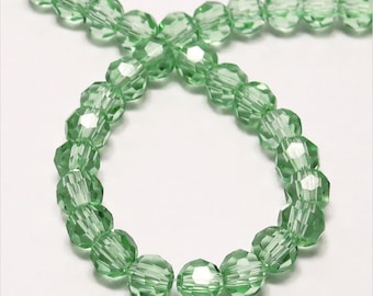 Set of 50 4 mm light green Crystal faceted beads