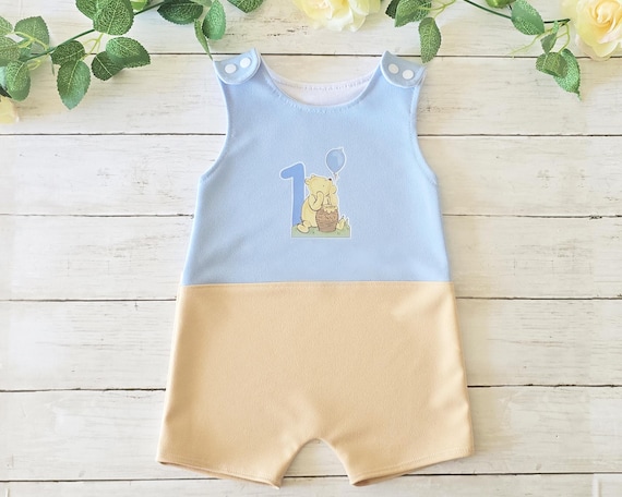 Vestito da compleanno classico Winnie the Pooh con palloncino blu