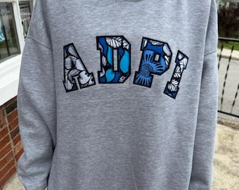 Alpha Delta Pi  Oversized Mock Neck Grey Sweatshirt WITH POCKETS!  Black Background and floral print Foreground letters