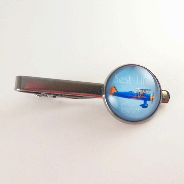 JW Men's Tie Bar featuring "Best Life Ever" on light blue background with an airplane. Jw menswear, jw accessories, jw gifts, jw items