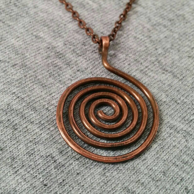 кулон в виде спирали. серебряный спираль для подвесок. кулон спираль. подвеска спираль серебро. круглый кулон спираль.