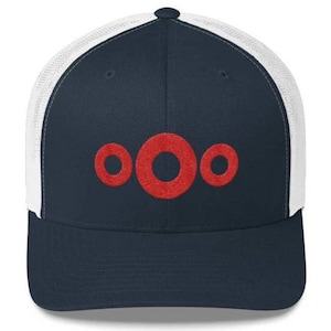 May include: A navy blue and white trucker hat with a red embroidered logo of three circles.