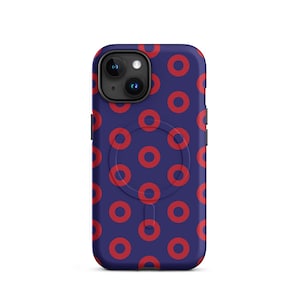 May include: A navy blue phone case with a pattern of red circles. The case has a camera cutout and a magnetic ring on the back. The design is repeated across the surface of the case.