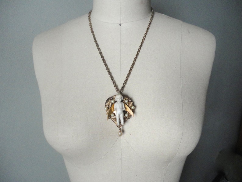 Bohemian Angel Necklace Heart Assemblage Necklace Assemblage Necklace Boho Upcycled Angel Locket Necklace Frozen Charlotte Heart Locket