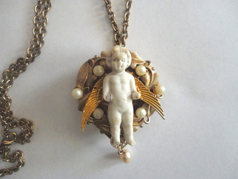 Bohemian Angel Necklace Heart Assemblage Necklace Assemblage Necklace Boho Upcycled Angel Locket Necklace Frozen Charlotte Heart Locket