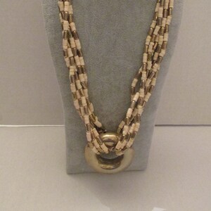 Beautiful vintage Chunky 1970&#39;s Brass Donut Centerpiece 3 Strand Ivory Color Genuine Bone Modernist Necklace