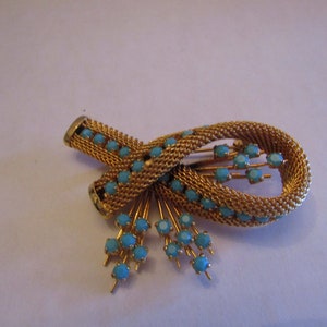 Stunning Woven Gold Tone and Blue Rhinestone Flower Brooch