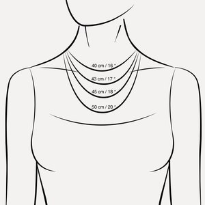 Puede incluir: Un dibujo de l&iacute;nea de un cuello y hombros de una persona con cuatro l&iacute;neas que representan diferentes longitudes de collar. Las longitudes est&aacute;n etiquetadas en pulgadas y cent&iacute;metros: 16 pulgadas/40 cm, 17 pulgadas/43 cm, 18 pulgadas/45 cm y 20 pulgadas/50 cm.