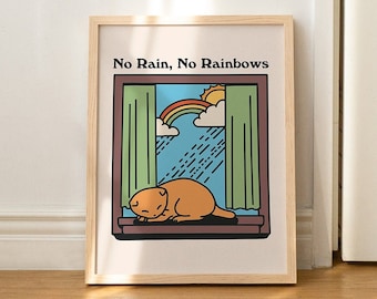 May include: A framed print with a cat sleeping in a windowsill. The window has a green curtain and a rainbow outside. The text on the print reads "No Rain, No Rainbows".