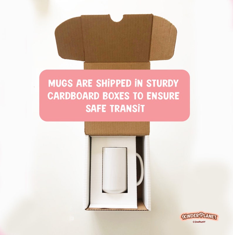 May include: A white ceramic mug is packaged in a brown cardboard box with the text "MUGS ARE SHIPPED IN STURDY CARDBOARD BOXES TO ENSURE SAFE TRANSIT" printed on the box. The box is open and the mug is visible inside.