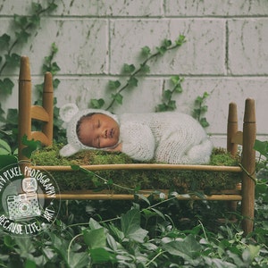 digital background for composites of wooden bed in front of an ivy covered  wall