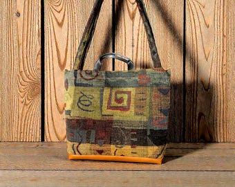 Artsy boho style handbag using recycled repurposed fabric old buttons and embellishments.