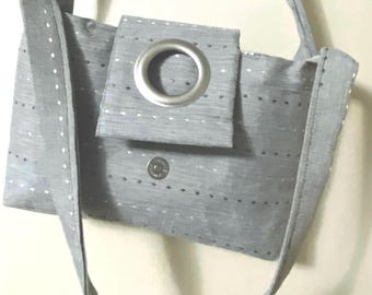 Classic style handbag made with recycled materials