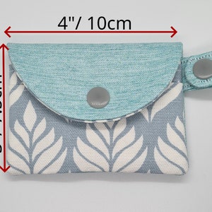 The measurements of the mini keychain card wallet is 4" by 3" or10*7.5cm.