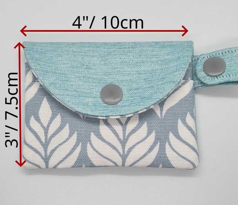 The measurements of the mini keychain card wallet is 4" by 3" or10*7.5cm.