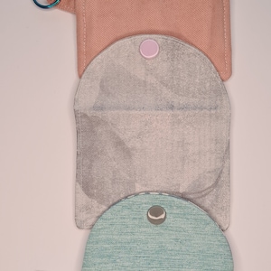 Back view on the three open card wallets