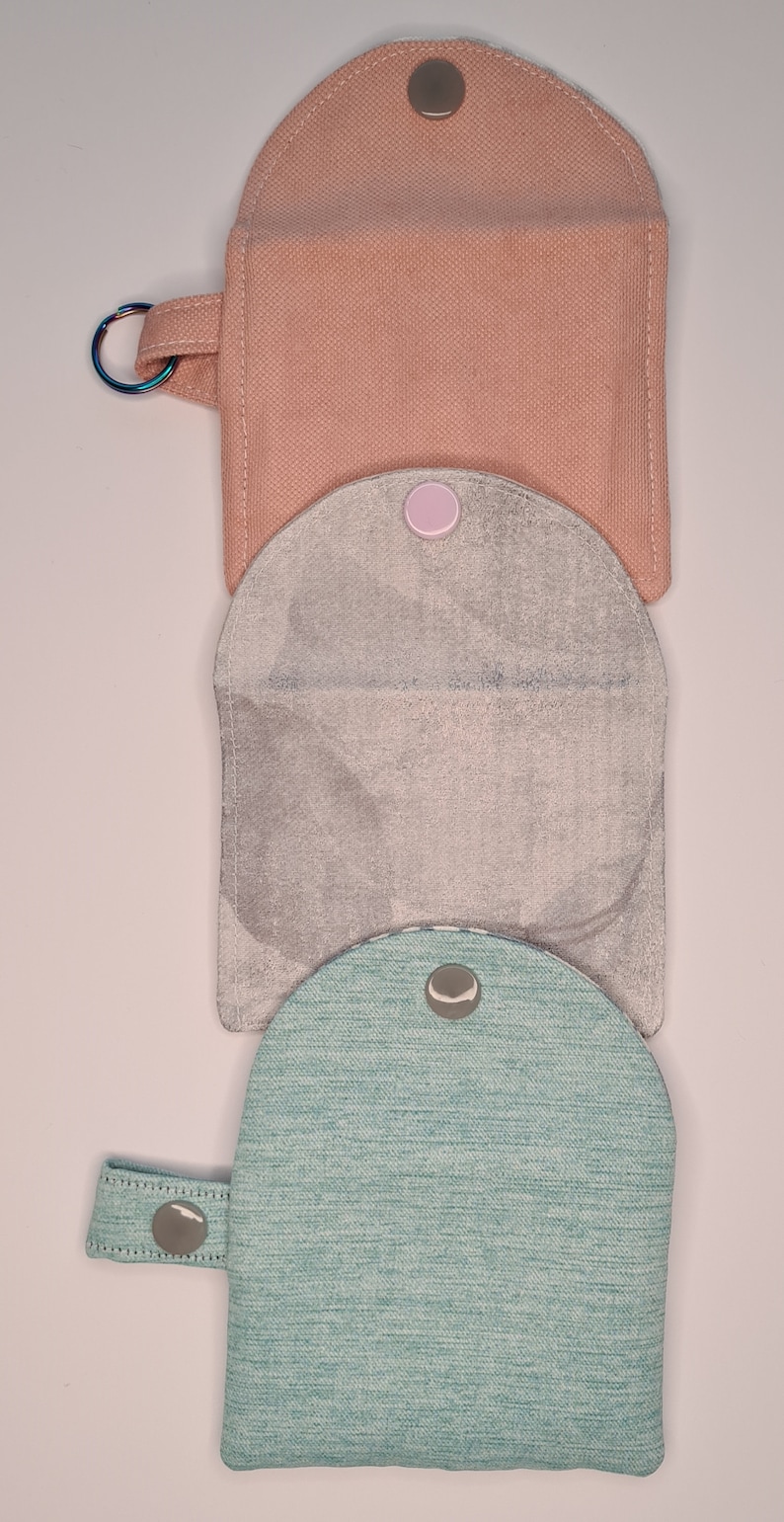 Back view on the three open card wallets