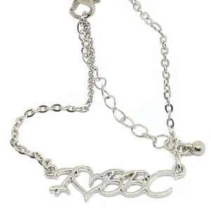 May include: Silver chain bracelet with a heart and the word "love" written in cursive.