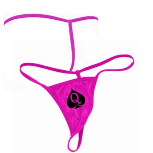 May include: Pink satin lingerie with a black spade and the letter Q printed on the front.