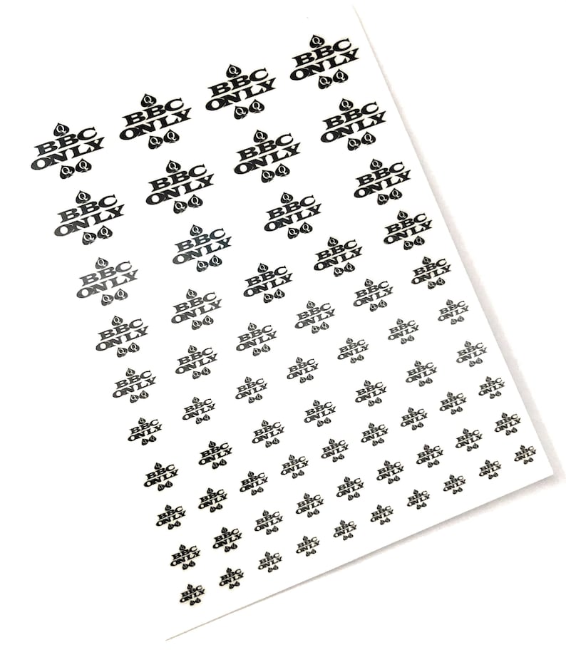May include: A sheet of black and white stickers with the text "BBC ONLY" repeated multiple times. Each sticker features a small black teardrop shape.