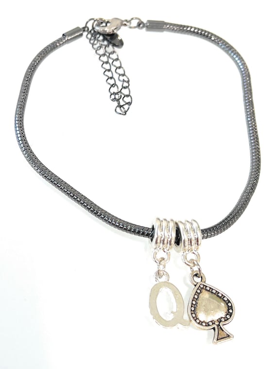 Tobillera de plata de la reina de o collar corona y España