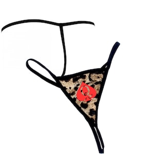 May include: Black and leopard print lingerie with a red queen of spades design.