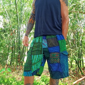 Patchwork Shorts by Lotus Tribe 100% cotton gender neutral hippy style handmade baggy long cargo shorts. Elastic waist. One size fits most.