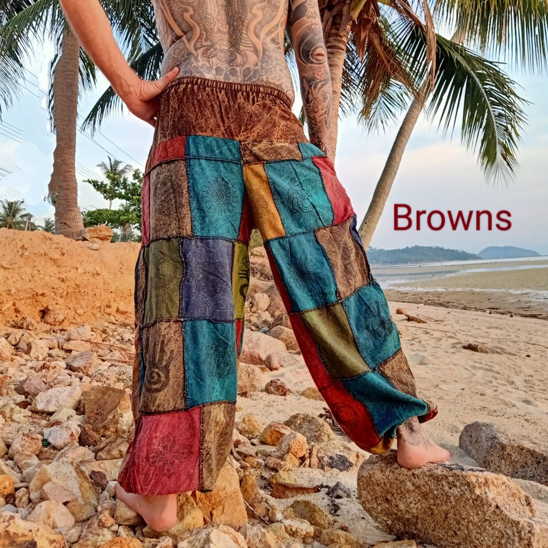 May include: Patchwork pants in a variety of colors including brown, red, blue, and green. The pants have a wide-leg design and a comfortable fit. The word "Browns" is written in red on the image.