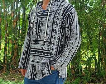 May include: A black and white patterned hooded pullover with a drawstring. The pullover has a geometric design and a relaxed fit.