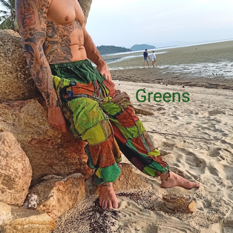 May include: Patchwork pants in shades of green, orange, and brown. The pants have a loose, comfortable fit and are made of various fabric squares sewn together. The word "Greens" is written in green on the image.