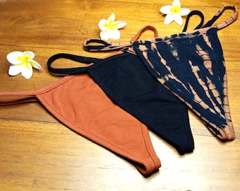3 Pack Thong Undies by Lotus Tribe stretchy breathable natural cotton women's G-string Thong Gift Set with 1 Rust, 1 Onyx and 1 Fire tie dye