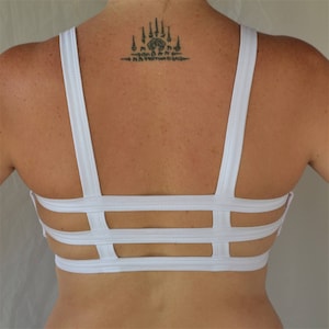 Trinity Bra in SNOW by Lotus Tribe with 3 horizontal back straps and no added underband has soft fit with light support best for A-C cups