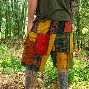 Patchwork Shorts by Lotus Tribe 100% cotton gender neutral hippy style handmade long loose shorts. Elastic at waist with 2 cargo pockets
