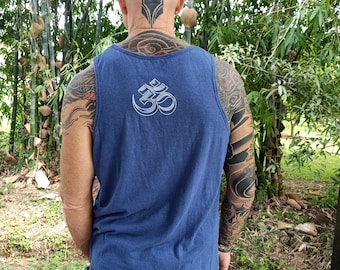 May include: A navy blue tank top with a white Om symbol printed on the back. The tank top is made of a soft, comfortable material.